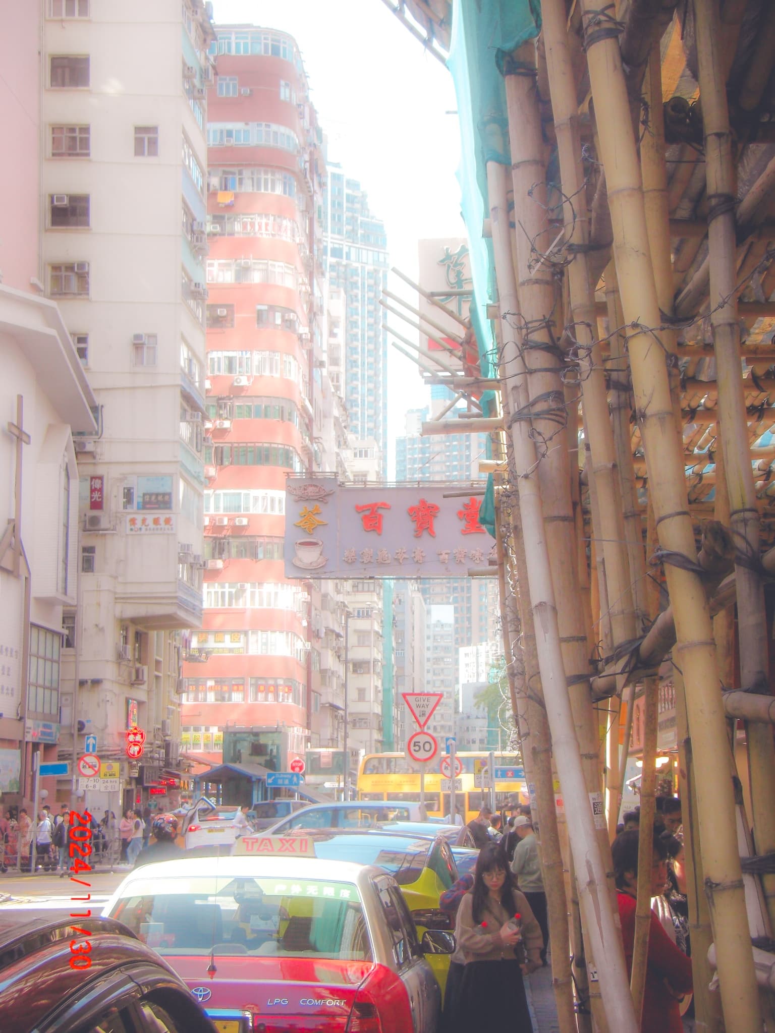lady holding 2 cokes